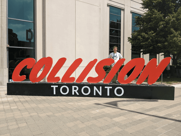 Myself atop the Collision sign at this year's conference